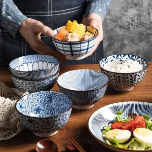 Japanese - style blue and white hand - painted 4.5 - inch ceramic bowl, retro - style rice bowl for home use.