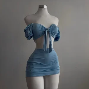 A sexy and fashionable two-piece short skirt with hollowed-out pleated puffed sleeves that wraps the hips