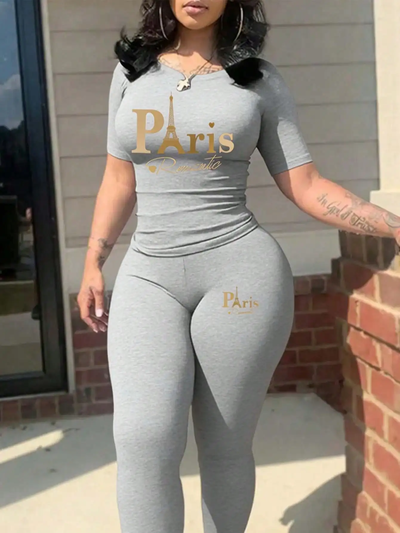 2026 women's new Paris printed two-piece set, casual short sleeved round neck T-shirt and tight pants long pants set - Image 3