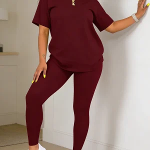 Fashion round-neck short-sleeved top paired with tight-fitting long pants - women's two-piece solid-color set